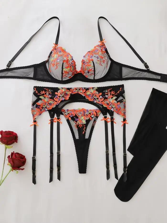 Ensemble de lingerie sculptante transparente à broderie florale de luxe 4 pièces avec bas cuissardes