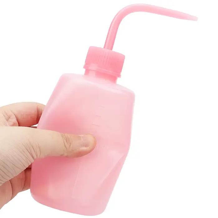 Čistiaca fľaša na mihalnice so zahnutým hrotom