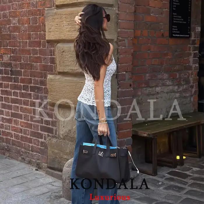 KONDALA Sexy a elegantný biely čipkovaný top s mašľou pre ženy