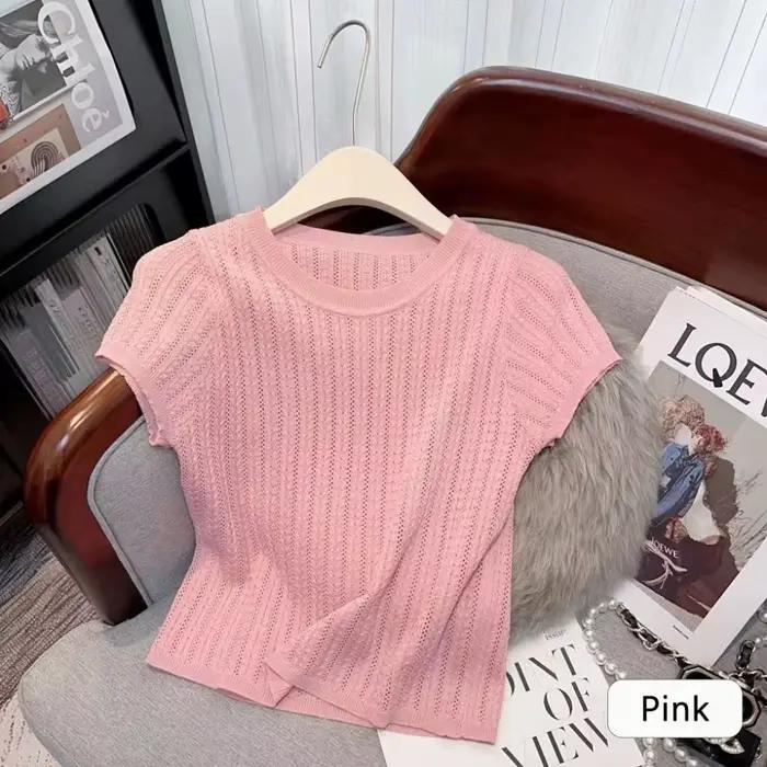 Elegantný pletený tričko s točenými bodmi