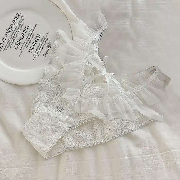 Sous-vêtements en dentelle sexy pour femmes, culotte fine, pantalon triangle, bord à volants, sans lueur, pur désir