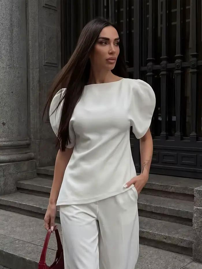 Elegantná biela blúzka s nafúknutými rukávmi a asymetrickým lemom pre ženy HH