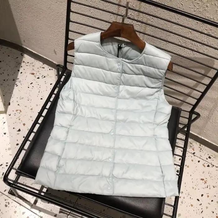Dámska bunda z bieleho kačacieho peria 90%