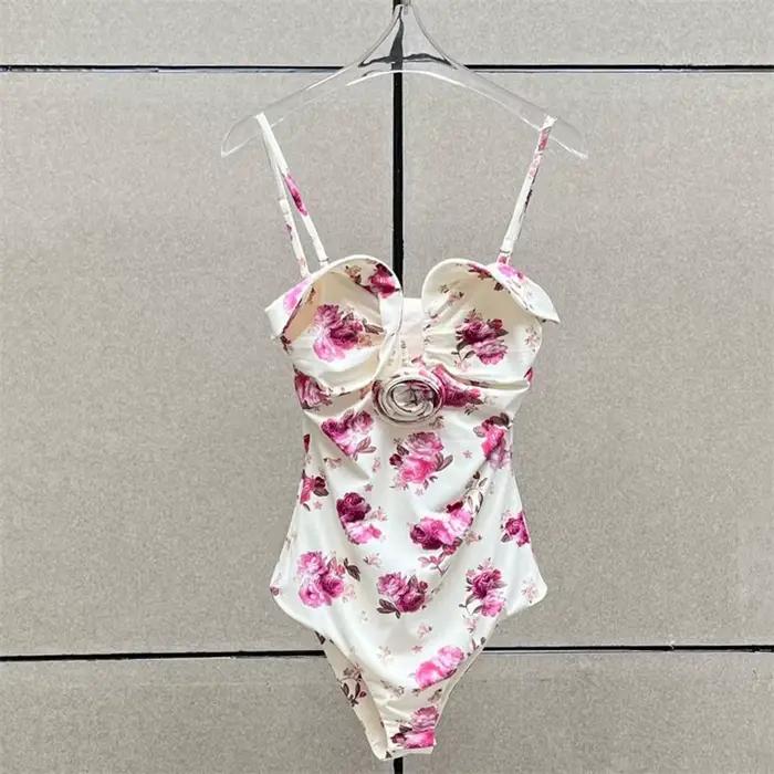 Nouveau body femme élastique ajusté à bretelles sans manches pour l'été 2026, avec décoration florale 3D, style corset