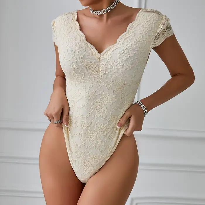 Combinaison une pièce élégante en dentelle blanche pour femmes, costume de batterie, string à col en V, shaper de batterie, vêtements en saillie ajustés, mode Y, sexy