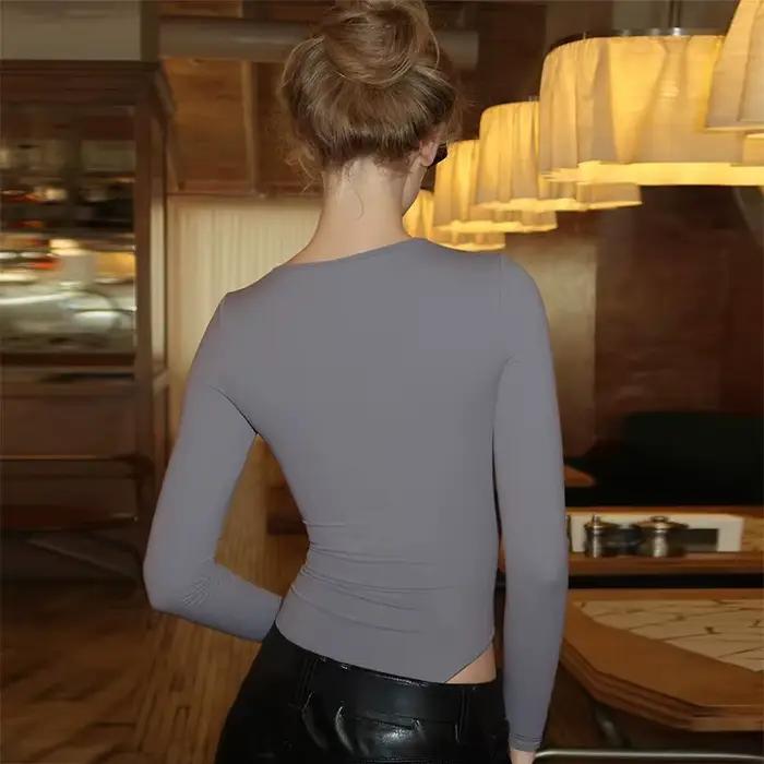 Dámske body so zipsom, nepravidelný strih