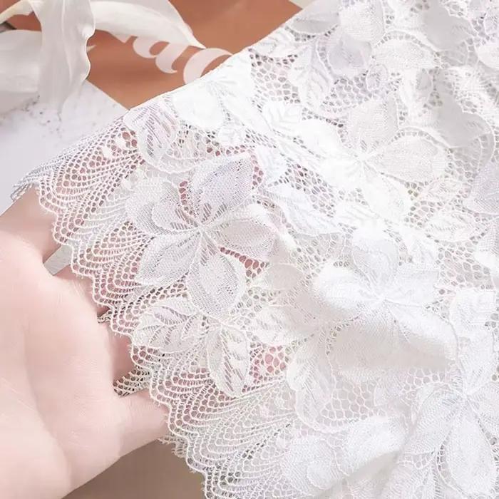 Culotte transparente taille moyenne en dentelle et maille florale ajourée pour femme, avec entrejambe en coton, anti-transparence, couleur unie