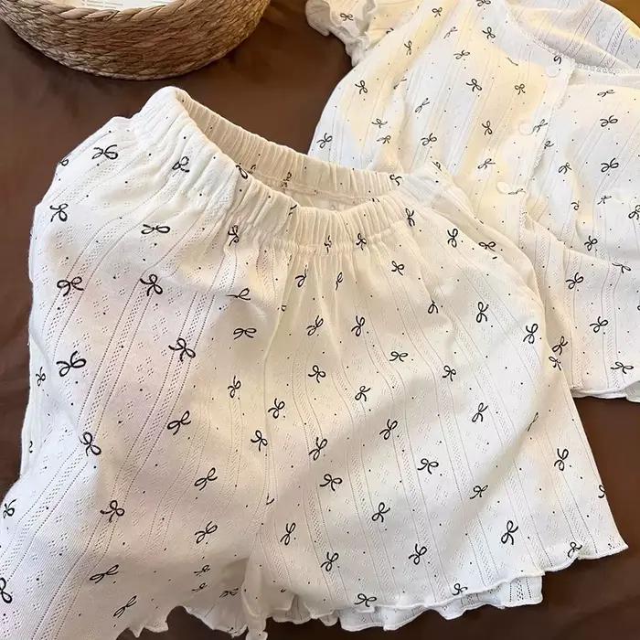 Pyžamo Sweet Girl s krátkym rukávom a šortkami s vankúšikmi na prsia a mašľou
