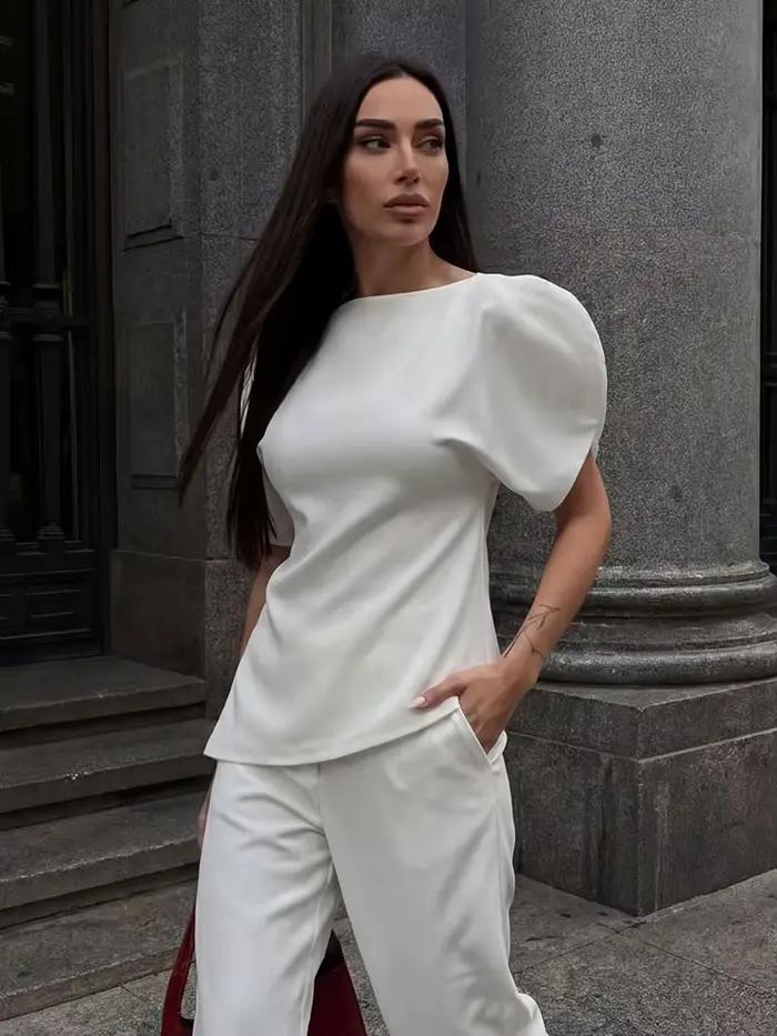Elegantná biela blúzka s nafúknutými rukávmi a asymetrickým lemom pre ženy HH