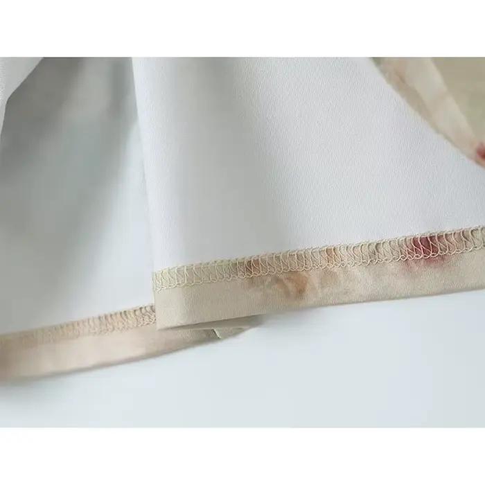 Dámske vintage pletené mini šaty s kvetinovou potlačou