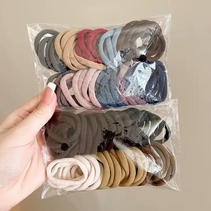 50 kusov farebných elastických gumičiek do vlasov Scrunchie pre ženy