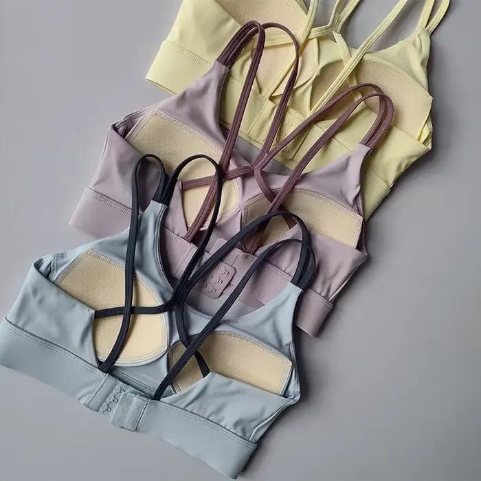 Soutien-gorge de sport de yoga pour femmes, conception de blocage de couleur intégrée avec soutien-gorge de sport à boucle