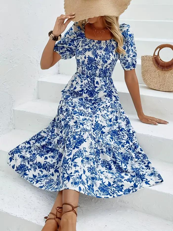Elegantná dlhá šaty s kvetinovou potlačou