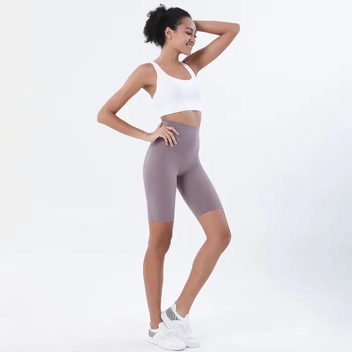 Shorts de yoga pour femmes en nylon et élasthanne haute qualité pour la pratique du yoga et du fitness en salle ou en plein air