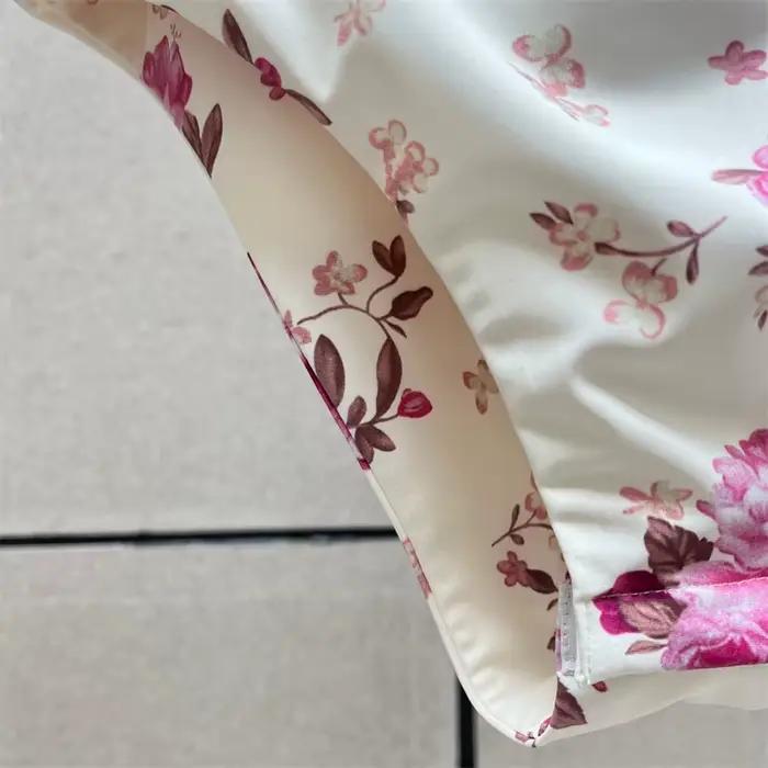 Nouveau body femme élastique ajusté à bretelles sans manches pour l'été 2026, avec décoration florale 3D, style corset