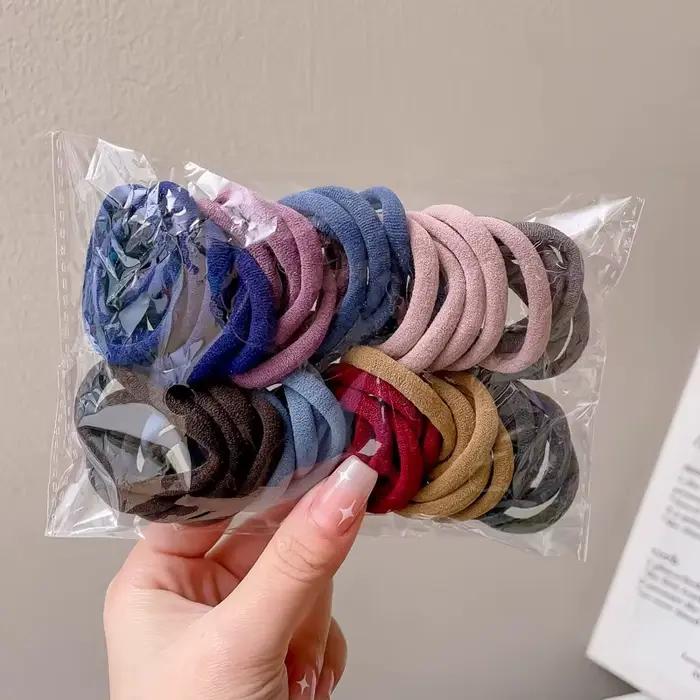 50 kusov farebných elastických gumičiek do vlasov Scrunchie pre ženy
