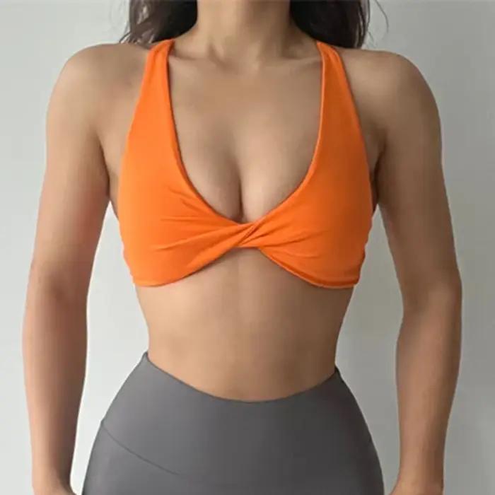 Brassière sportive SHINBENE en nylon respirante avec armatures et brides croisées pour femmes activités physiques yoga running exposant dos délicat