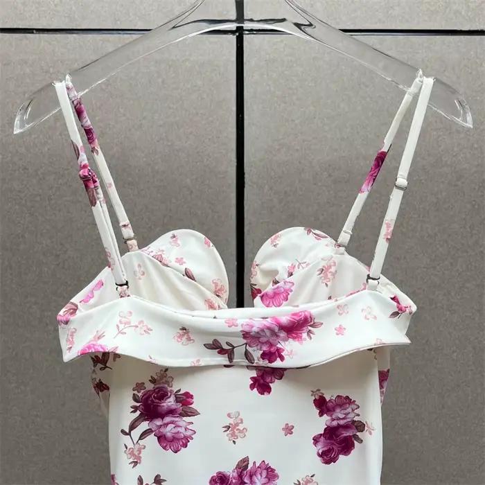 Nouveau body femme élastique ajusté à bretelles sans manches pour l'été 2026, avec décoration florale 3D, style corset